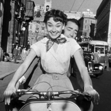 cropped-audrey_hepburn_and_gregory_peck_on_vespa_in_roman_holiday_trailer1.jpg
